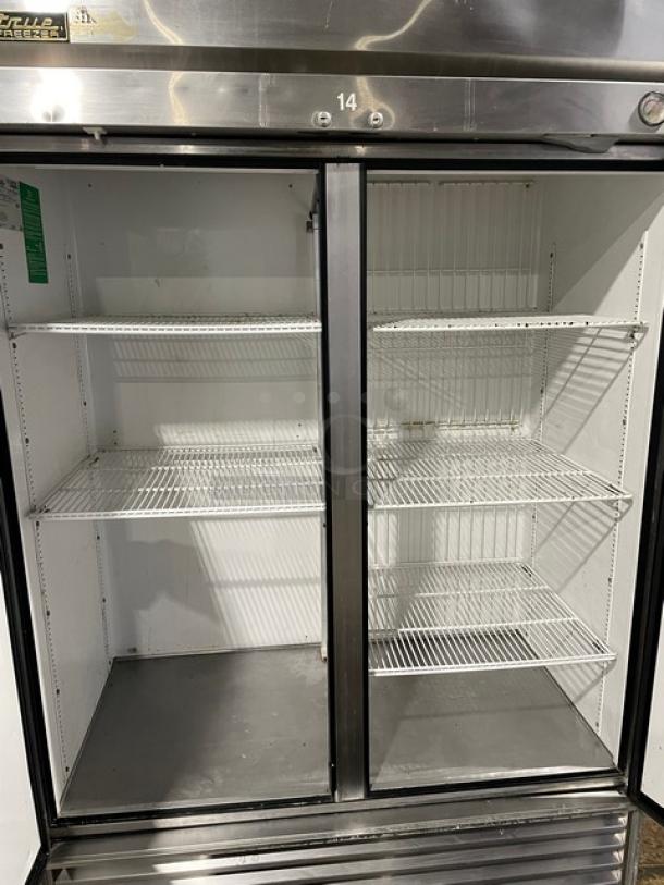 True Commercial Stainless Steel Solid 2 Door Reach In Freezer! With Poly Coated Wire Racks! Model: T-49 SN: 1-3548796! 115V 1 Phase! On Casters! - Image 5 of 9