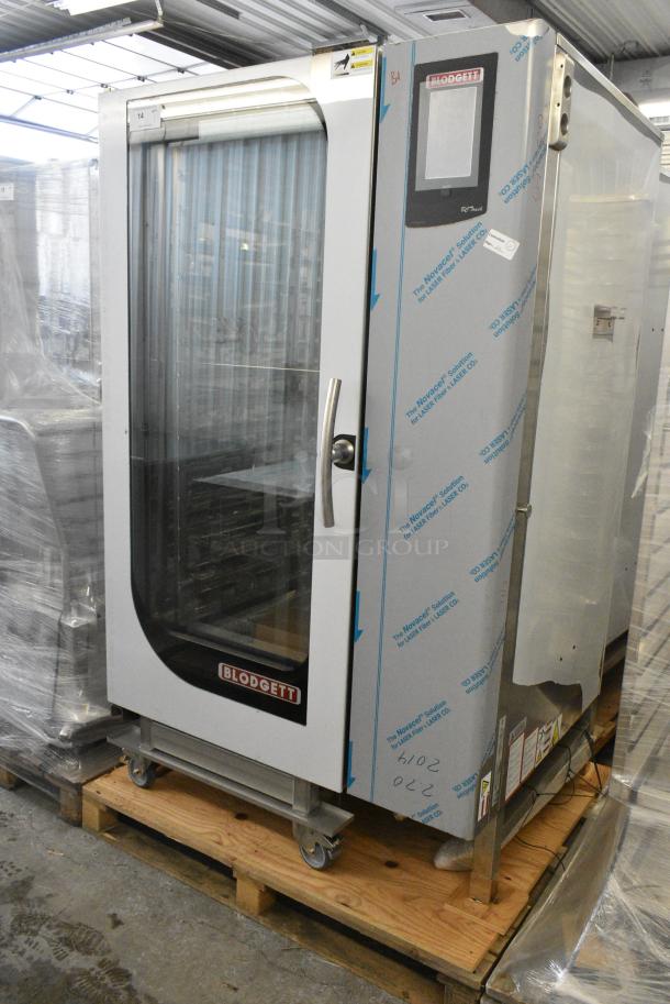 BRAND NEW SCRATCH AND DENT! Blodgett BCT-202/KPE 2.20 Stainless Steel Commercial Electric Powered Roll In Rack Combi Convection Oven w/ View Through Door and Metal Pan Transport Rack. 208 Volts, 3 Phase. - Image 1 of 7