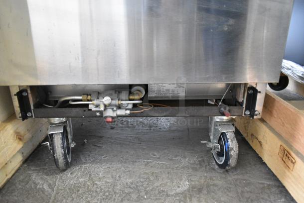 BRAND NEW SCRATCH AND DENT! 2018 American Range AR2B-12RG Stainless Steel Commercial Natural Gas Powered 2 Burner Range w/ Flat Top Griddle, Oven, Over Shelf and Back Splash on Commercial Casters. - Image 10 of 11