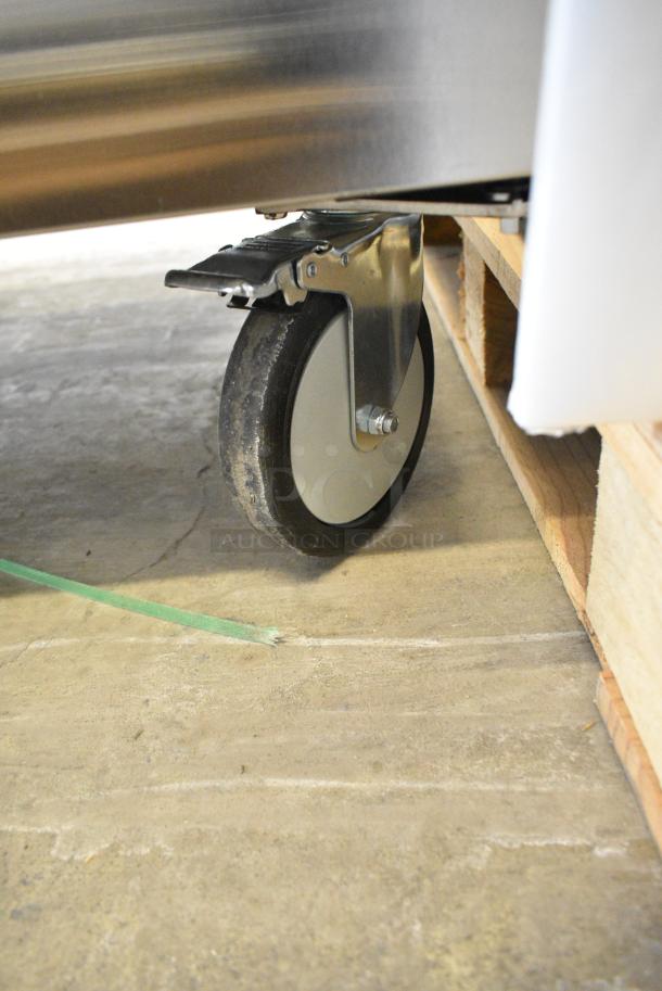 BRAND NEW SCRATCH AND DENT!  Beverage Air TMR2HC-1S Stainless Steel Commercial 2 Door Reach In Cooler w/ Poly Coated Racks on Commercial Casters. 115 Volts, 1 Phase. Tested and Working! - Image 5 of 10