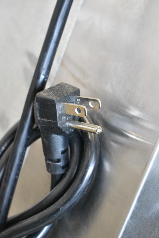 BRAND NEW SCRATCH AND DENT!  Beverage Air TMR2HC-1S Stainless Steel Commercial 2 Door Reach In Cooler w/ Poly Coated Racks on Commercial Casters. 115 Volts, 1 Phase. Tested and Working! - Image 8 of 10