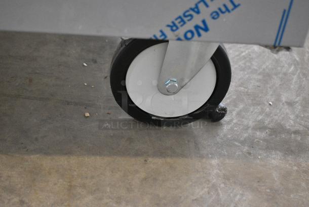 BRAND NEW SCRATCH AND DENT! Beverage Air TMR2HC-1S Stainless Steel Commercial 2 Door Reach In Cooler w/ Poly Coated Racks on Commercial Casters. 115 Volts, 1 Phase. Tested and Working! - Image 3 of 8