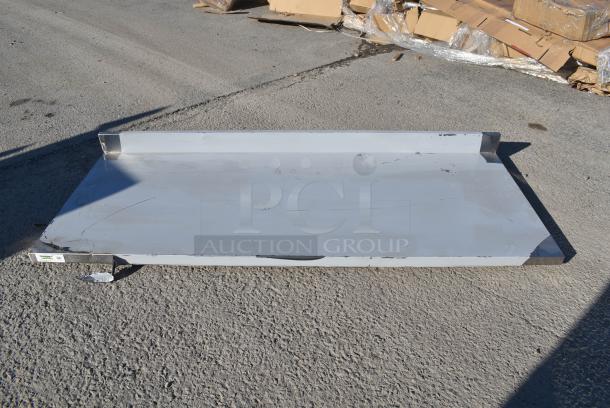 BRAND NEW SCRATCH AND DENT! Regency 600TSB3072S 30" x 72" 16-Gauge Stainless Steel Commercial Work Tabletop - Image 1 of 4
