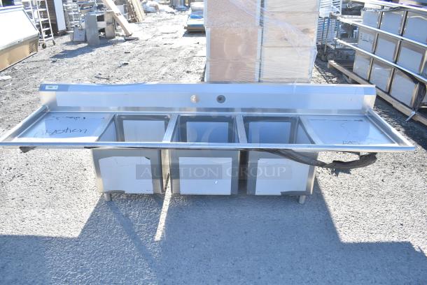 BRAND NEW SCRATCH AND DENT! Regency 600S31824224 84 1/2" 16-Gauge Stainless Steel Three Compartment Commercial Sink with 1 Drainboard - 18" x 24" x 14" Bowls. No Legs. - Image 1 of 5