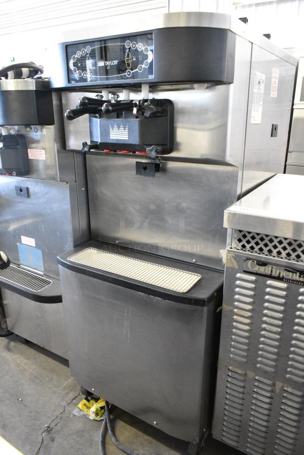 Taylor C716-33 Stainless Steel Commercial Floor Style Water Cooled 2 Flavor w/ Twist Soft Serve Ice Cream Machine on Commercial Casters. 208-230 Volts, 3 Phase. - Image 1 of 10