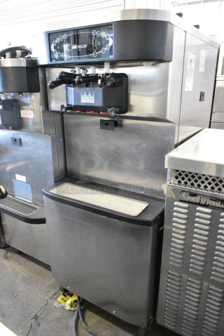 Taylor C716-33 Stainless Steel Commercial Floor Style Water Cooled 2 Flavor w/ Twist Soft Serve Ice Cream Machine on Commercial Casters. 208-230 Volts, 3 Phase.