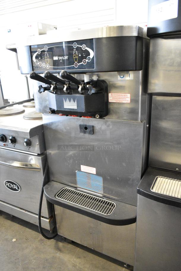 Taylor C723-33 Stainless Steel Commercial Floor Style Water Cooled 2 Flavor w/ Twist Soft Serve Ice Cream Machine on Commercial Casters. 208-230 Volts, 3 Phase. - Image 1 of 9