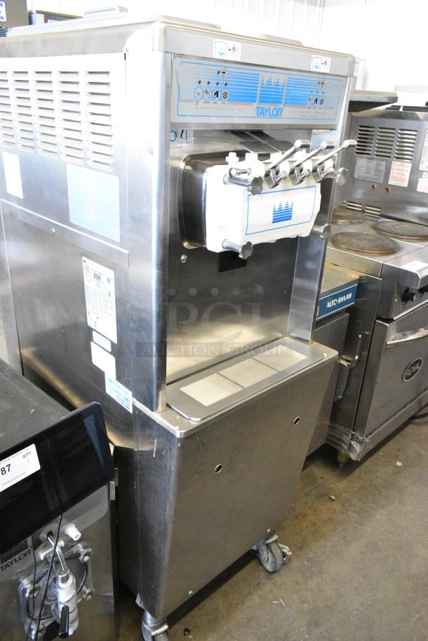 Taylor 794-33 Stainless Steel Commercial Floor Style Water Cooled 2 Flavor w/ Twist Soft Serve Ice Cream Machine on Commercial Casters. 208-230 Volts, 3 Phase. - Image 1 of 10