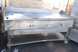 Stainless Steel Commercial Flat Top Griddle w/ Under Shelf on Commercial Casters.