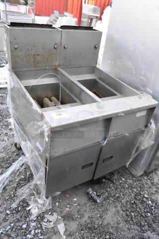 Pitco Frialator SG14R-S Stainless Steel Commercial Floor Style Natural Gas Powered 2 Bay Deep Fat Fryer. 122,000 BTU.