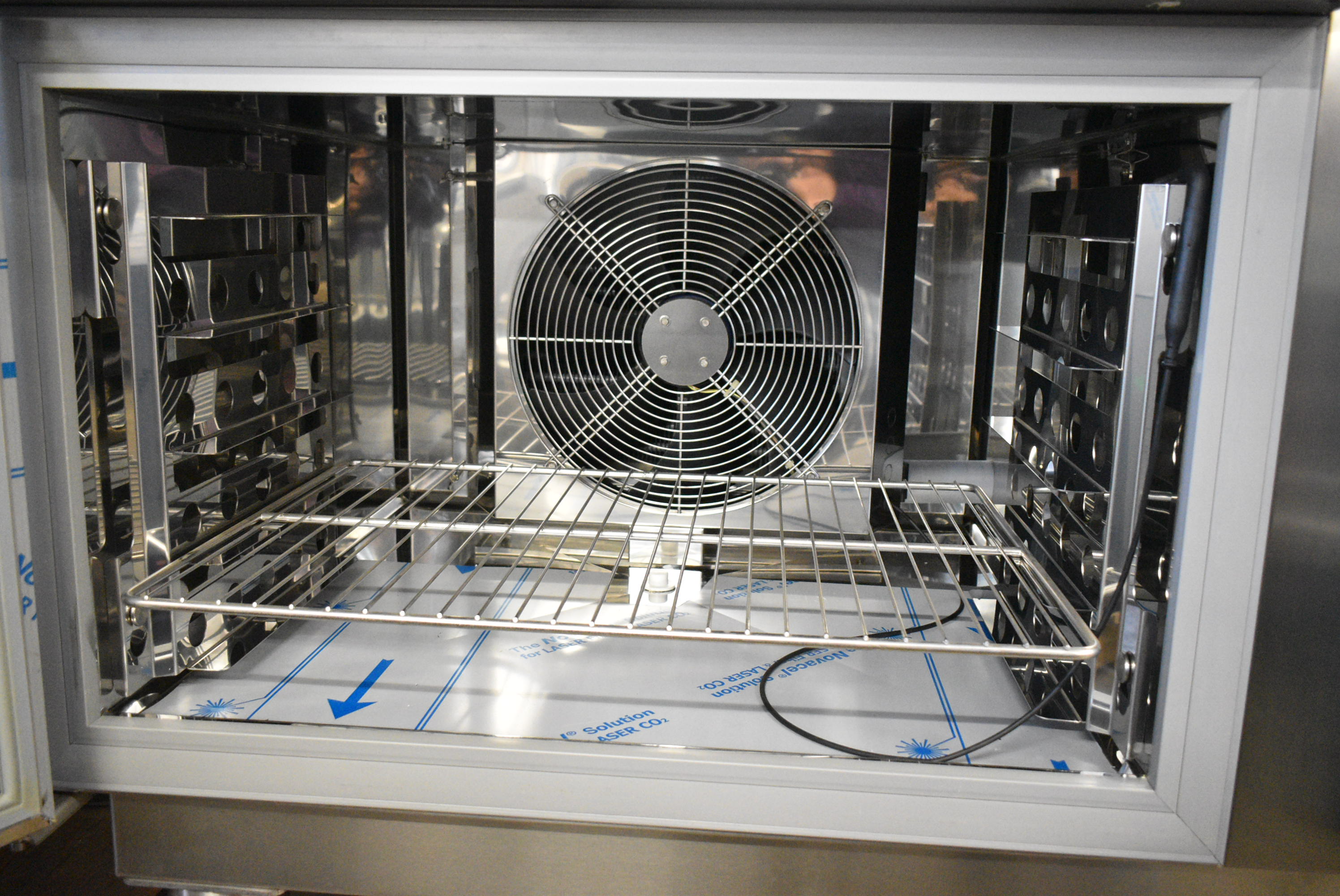 Brand new blast chiller interior showing rack configuration and pan capacity