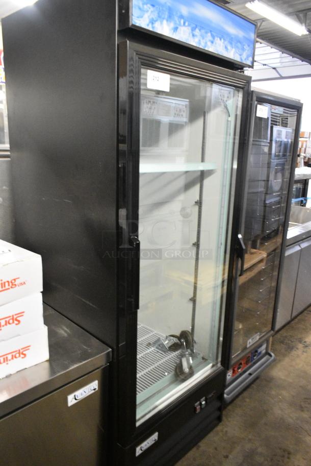 BRAND NEW SCRATCH AND DENT! 2024 Avantco 178GDC23HCB Metal Commercial Single Door Reach In Cooler Merchandiser w/ Poly Coated Racks and Commercial Casters. 115 Volts, 1 Phase. Tested and Powers On But Does Not Get Cold - Image 1 of 6