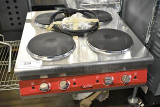 BRAND NEW SCRATCH AND DENT! Avantco 177CER400 Stainless Steel Commercial Countertop Electric Powered French Top 4 Burner Range. 240 Volts, 1 Phase.