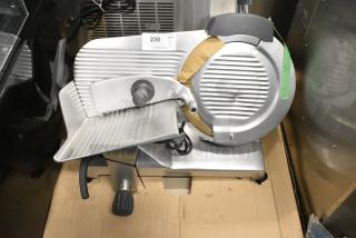 BRAND NEW SCRATCH AND DENT! Hobart Centerline EDGE14-11 Stainless Steel Commercial Countertop 14" Manual Meat Slicer w/ Blade Sharpener. 115 Volts, 1 Phase. Tested and Working!