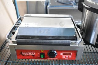 BRAND NEW SCRATCH AND DENT! 2024 Avantco 177PG200ST Stainless Steel Commercial Panini Sandwich Grill with Timer, Smooth Plates, and 13 3/8" x 8 3/4" Cooking Surface. 120 Volts, 1 Phase. Tested and Working!