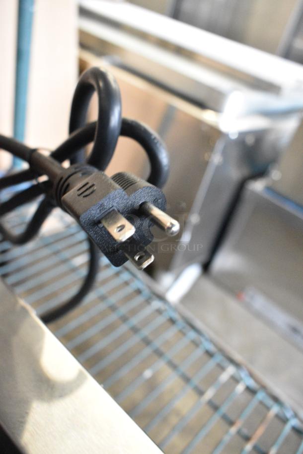 BRAND NEW SCRATCH AND DENT! 2024 Avantco 177PG200ST Stainless Steel Commercial Panini Sandwich Grill with Timer, Smooth Plates, and 13 3/8" x 8 3/4" Cooking Surface. 120 Volts, 1 Phase. Tested and Working! - Image 7 of 8