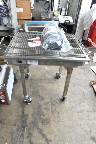 BRAND NEW SCRATCH AND DENT! Backyard Pro Stainless Steel Portable Charbroiler Grill on Commercial Casters.