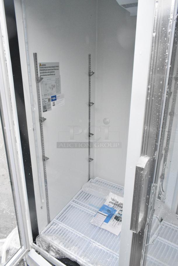 BRAND NEW SCRATCH AND DENT! Avantco 178GDC49HCW 53" White Customizable Swing Glass Door Merchandiser Refrigerator with LED Lighting. 115 Volts, 1 Phase. - Image 2 of 5
