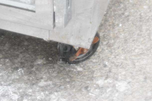 BRAND NEW SCRATCH AND DENT! Traulsen RHT232WUT-HHG Stainless Steel Commercial 58" 2 Section 4 Door Reach In Refrigerator Merchandiser on Commercial Casters. 115 Volts, 1 Phase. - Image 7 of 8