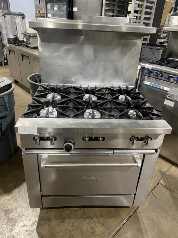 AWESOME! SunFire Commercial Stainless Steel Natural Gas Powered 6 Burner Range/Oven Combo! With Back Splash & Overhead Salamander Shelf! With Wired Oven Rack! On Casters! - Image 1 of 9