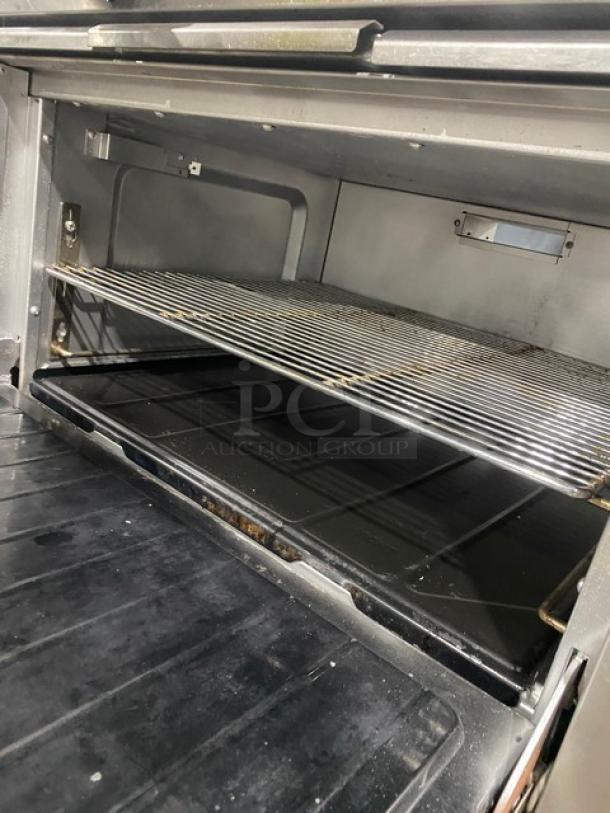 AWESOME! SunFire Commercial Stainless Steel Natural Gas Powered 6 Burner Range/Oven Combo! With Back Splash & Overhead Salamander Shelf! With Wired Oven Rack! On Casters! - Image 7 of 9