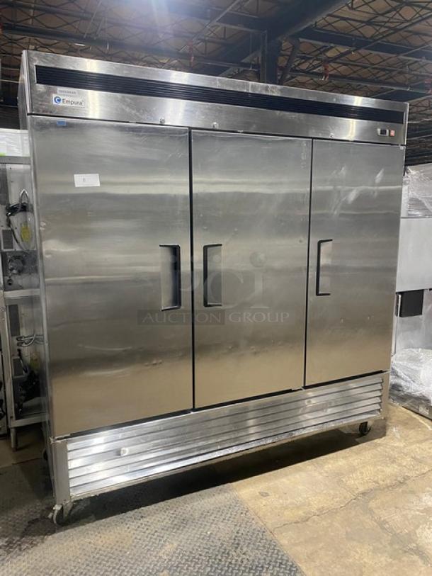 WOW! Empura Commercial Stainless Steel Solid 3 Door Reach In Refrigerator! With Poly Coated Wire Racks! Model: E72 SN: E72140730J2002! 115V 1 Phase! On Casters! - Image 1 of 8