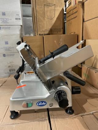 NEW! SCRATCH-N-DENT! Globe Commercial Electric Powered Countertop Manual Gravity Feed Deli Meat/Cheese Slicer! With 12" Wide Blade! Model: G12 SN: 546332! 115V 1 Phase! On Legs!