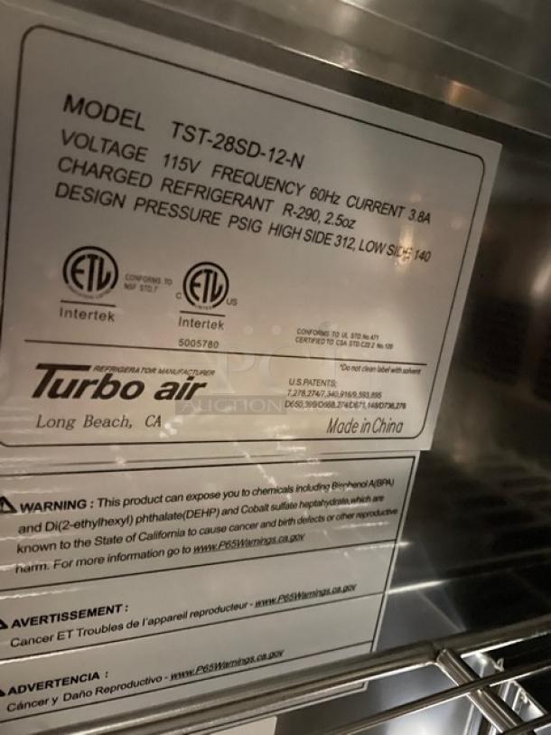 BRAND NEW! IN THE BOX! Turbo Air Super Deluxe Series Commercial Stainless Steel 1 Door Refrigerated Bain Marie Style Mega Top Sald/Sandwich Prep Table! With Chrome Plated Wire Racks! With Removable Cutting Board! With Clear Polycarbonate Food Pans! Model: TST-28SD-12-N! 115V 1 Phase! With Casters! - Image 14 of 14