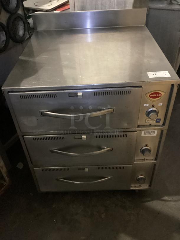 Wells Three Drawer Electric Warmer 
Model# RW-3
29-⅜ x 30 x 38-1/2 - Image 1 of 6