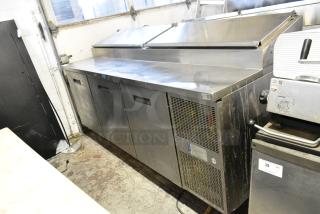 Randell Stainless Steel Commercial Pizza Prep Table on Commercial Casters. 115 Volts, 1 Phase. Tested and Powers On But Does Not Get Cold