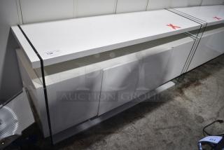 White Counter w/ 4 Doors.