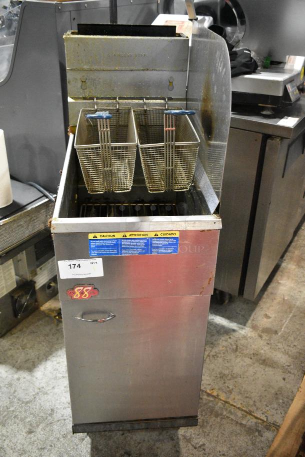 Pitco Frialator 40D Stainless Steel Commercial Floor Style Natural Gas Powered Deep Fat Fryer w/ 2 Metal Fry Baskets and Right Side Splash Guard. 115,000 BTU. - Image 1 of 6
