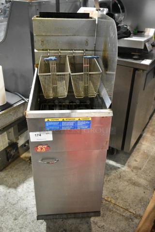 Pitco Frialator 40D Stainless Steel Commercial Floor Style Natural Gas Powered Deep Fat Fryer w/ 2 Metal Fry Baskets and Right Side Splash Guard. 115,000 BTU.