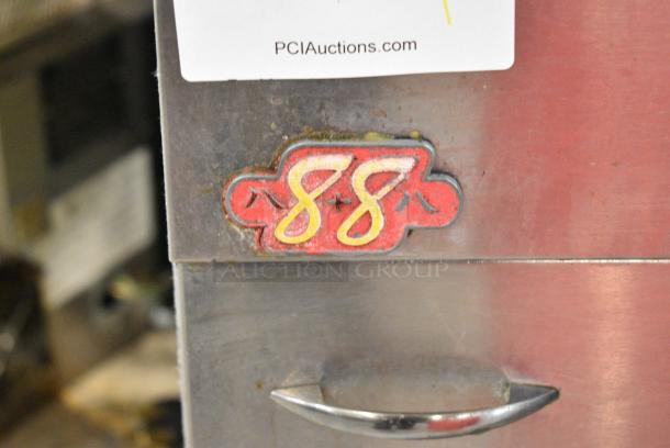 Pitco Frialator 40D Stainless Steel Commercial Floor Style Natural Gas Powered Deep Fat Fryer w/ 2 Metal Fry Baskets and Right Side Splash Guard. 115,000 BTU. - Image 2 of 6