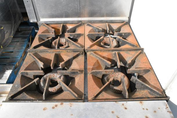 American Range Stainless Steel Commercial Gas Powered 4 Burner Range w/ Oven and Back Splash on Commercial Casters. - Image 4 of 8