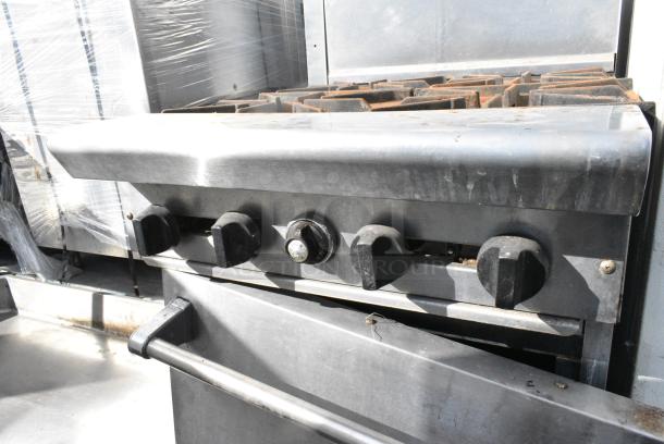 American Range Stainless Steel Commercial Gas Powered 4 Burner Range w/ Oven and Back Splash on Commercial Casters. - Image 5 of 8