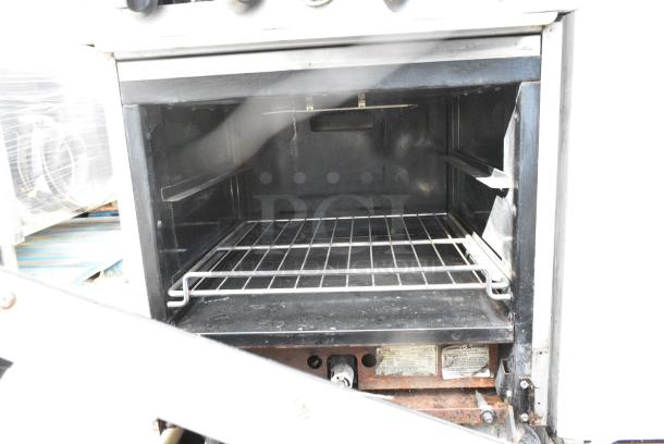American Range Stainless Steel Commercial Gas Powered 4 Burner Range w/ Oven and Back Splash on Commercial Casters. - Image 7 of 8