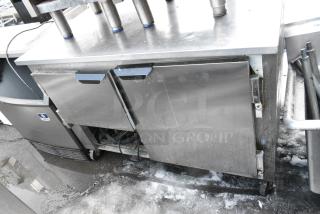 Cooltech CMPH-48LB Stainless Steel Commercial 2 Door Undercounter Cooler on Commercial Casters. 115 Volts, 1 Phase.