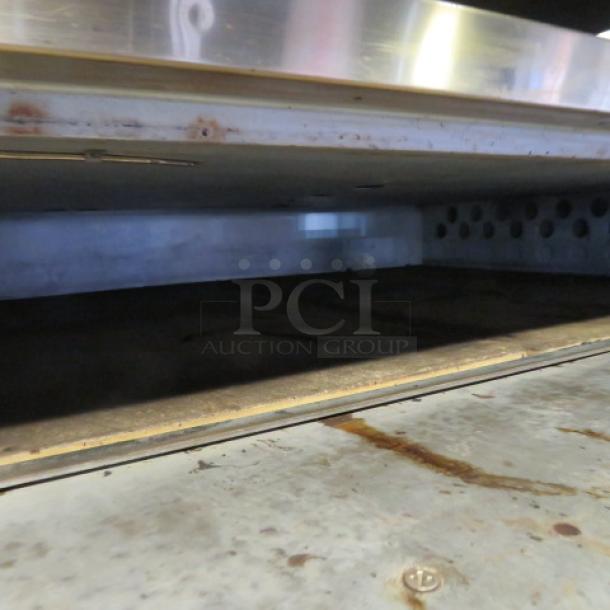 BEAUTIFUL Bakers Pride Natural Gas Super Deck Pizza Oven. Model# Y800. Serial # 27440. 84X51X66. This Double Stack Oven Is WORKING ,CLEAN, And Recently Serviced! 2XBID. You Will Receive 1 Double Stack Unit including 2 ovens. $ 46,392.00. - Image 4 of 8