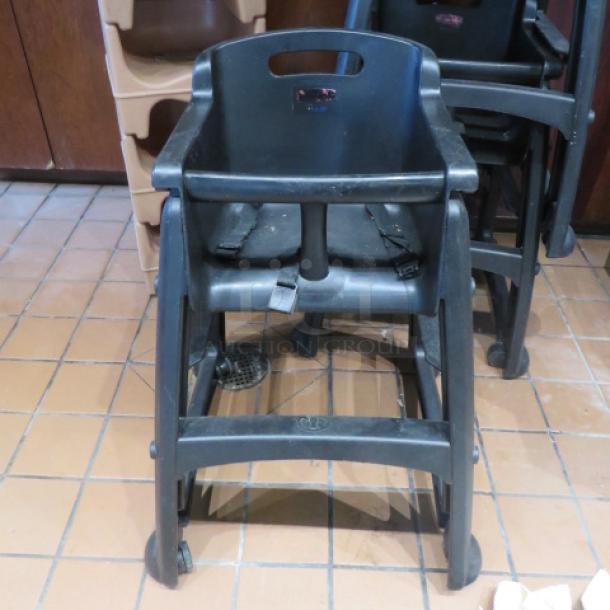 One Rubbermaid High Chair With Safety Straps On Casters. - Image 1 of 2