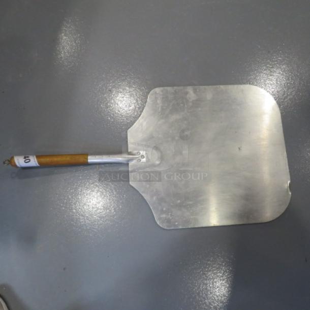 One 16X31 Pizza Peel. - Image 1 of 1