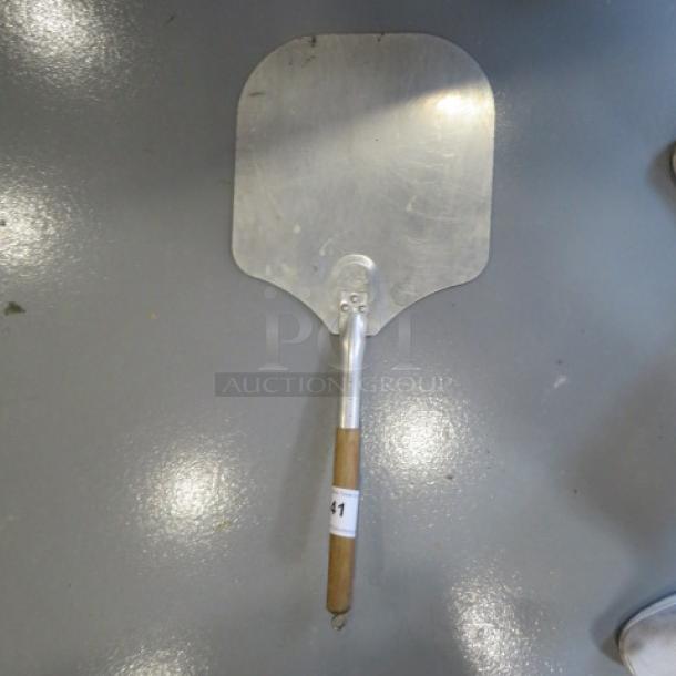 One 12X27 Pizza Peel. - Image 1 of 1