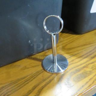 One Lot Of 31 Stainless Steel Table Top Number Stands.