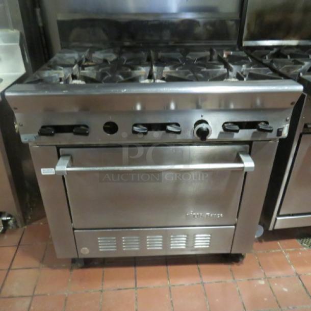 One US Range Natural Gas 6 Burner/Convection Oven With 2 Racks On Casters. Model# PS-6-26RC. 36X23X43. Tested And Working. - Image 2 of 5