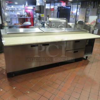 One Delfield 2 Door, 2 Drawer MEGA Top Refrigerated  Pizza Prep Table With A Custom Made 24 Inch Marble Top Board And 2 Racks On Casters. Model# 186114PTB. 115 Volt. $14,691.00. TESTED AND WORKING.