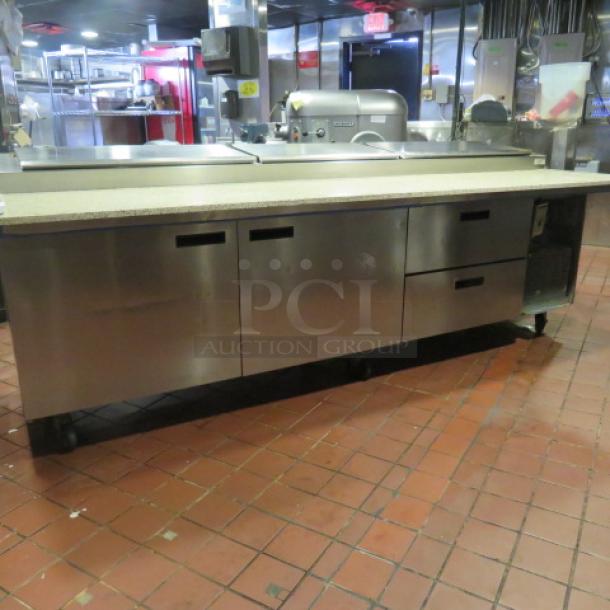 One Delfield 2 Door, 2 Drawer MEGA Top Refrigerated  Pizza Prep Table With A Custom Made 24 Inch Marble Top Board And 2 Racks On Casters. Model# 186114PTB. 115 Volt. $14,691.00. TESTED AND WORKING. - Image 2 of 8