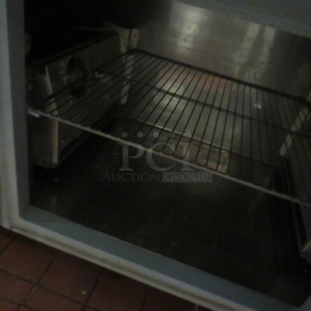 One Delfield 2 Door, 2 Drawer MEGA Top Refrigerated  Pizza Prep Table With A Custom Made 24 Inch Marble Top Board And 2 Racks On Casters. Model# 186114PTB. 115 Volt. $14,691.00. TESTED AND WORKING. - Image 8 of 8