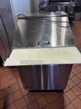 One Turbo Air 1 Door Refrigerated Prep Table On Casters. Model# MST-28-12-N. 115 Volt. 27.5X38X45. $2799.38