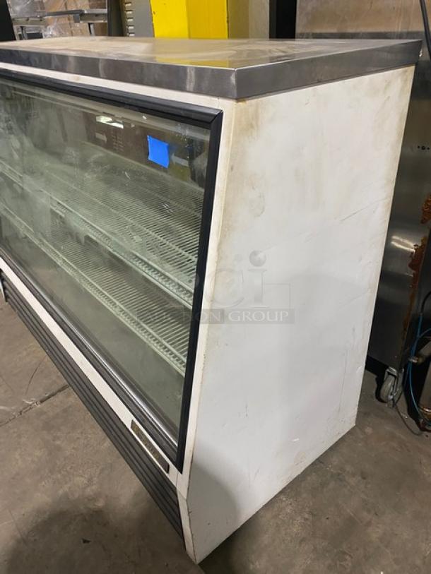 True Commercial White Slanted Glass Refrigerated Meat Deli Display Show Case! With Stainless Steel Serve Over Countertop! With Adjustable Poly Coated Wire Shelves! With Rear Double Sliding Glass Doors! Model: TSID-72-3 SN: 5045310! 115V 1 Phase! - Image 2 of 10