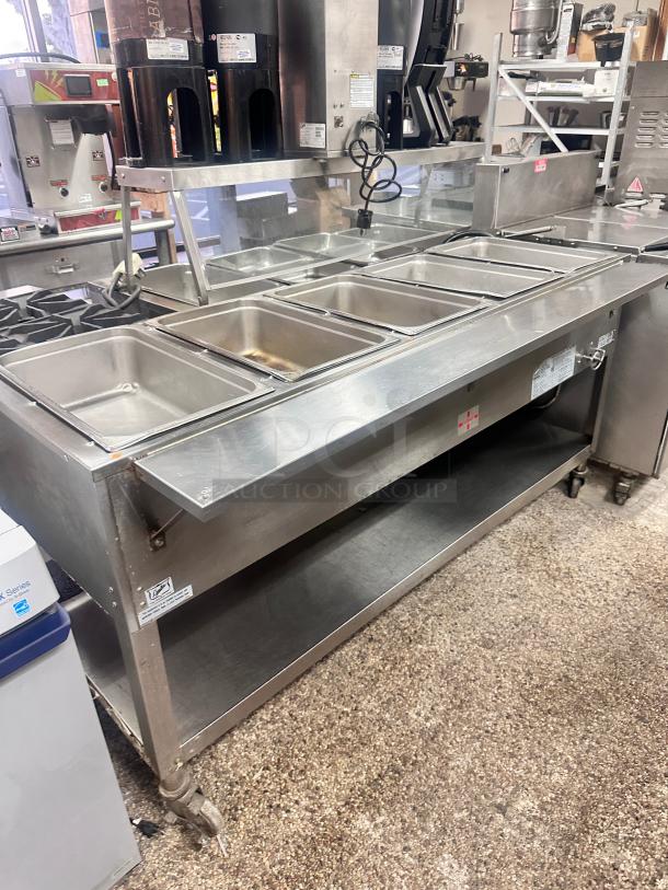 Excellent Duke  Aerohot 72" Gas Stationary Hot Food Steamtable Wet Bath Unit With 5 Food Wells And Carving Board, 27,500 BTU Tested and Working! - Image 1 of 9